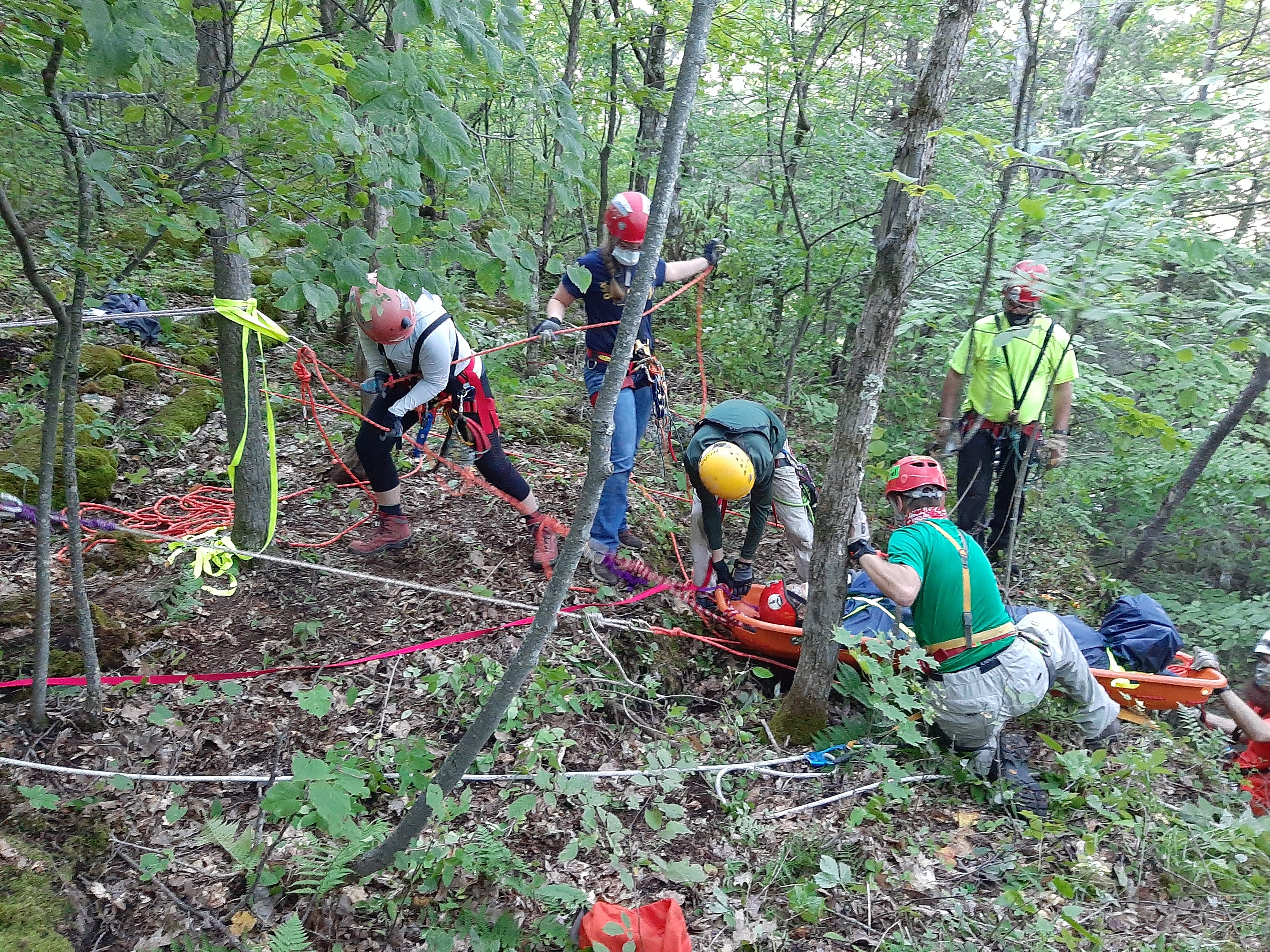 Level 1 students pull a patient up over a cliff
