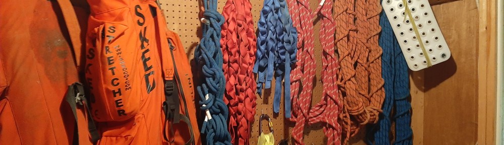 Left to right, 2 skeds hanging, and then some rope and webbing.