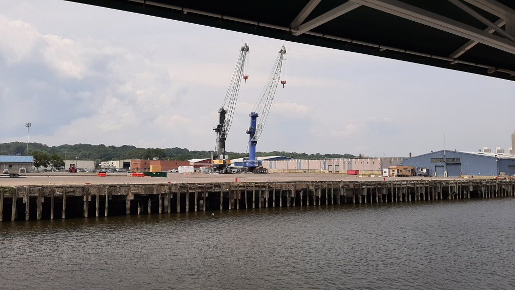 Foreground is the Hudson, with a seawall and then a wide open area for the port of Albany.