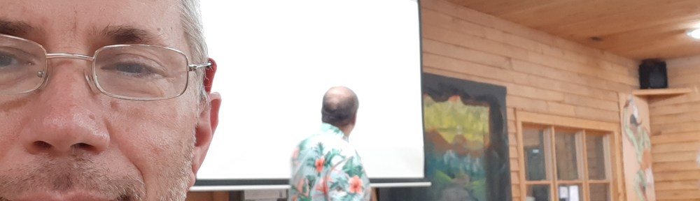 Selfie with me to the left in a Hawaiian shirt.