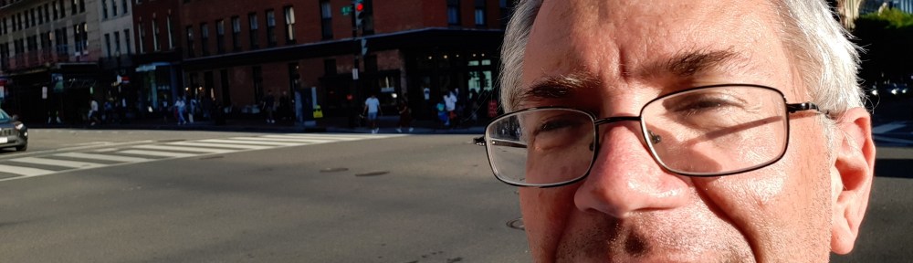 Selfie taken diagonally across the street from "Gregory's Coffee" in Washington DC