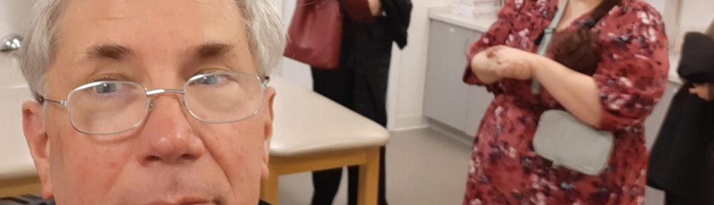 Me standing in a lab room at my new school.