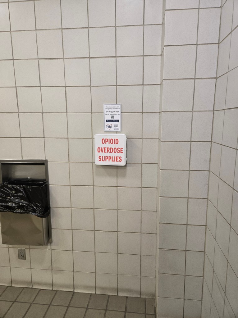 Restroom with Opioid Overdoes Supply box on the wall.