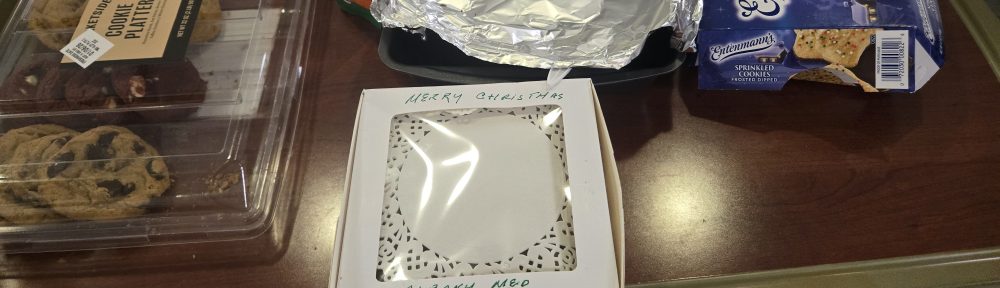 Image of a box of fudge that says Merry Christmas Albany Med ER